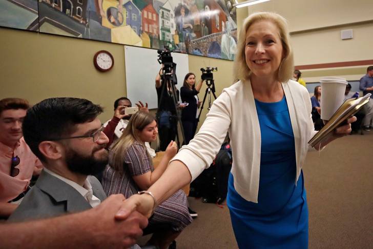 Kirsten Gillibrand shakes hands at a mental health roundtable event in Massachusetts on August 20, 2019